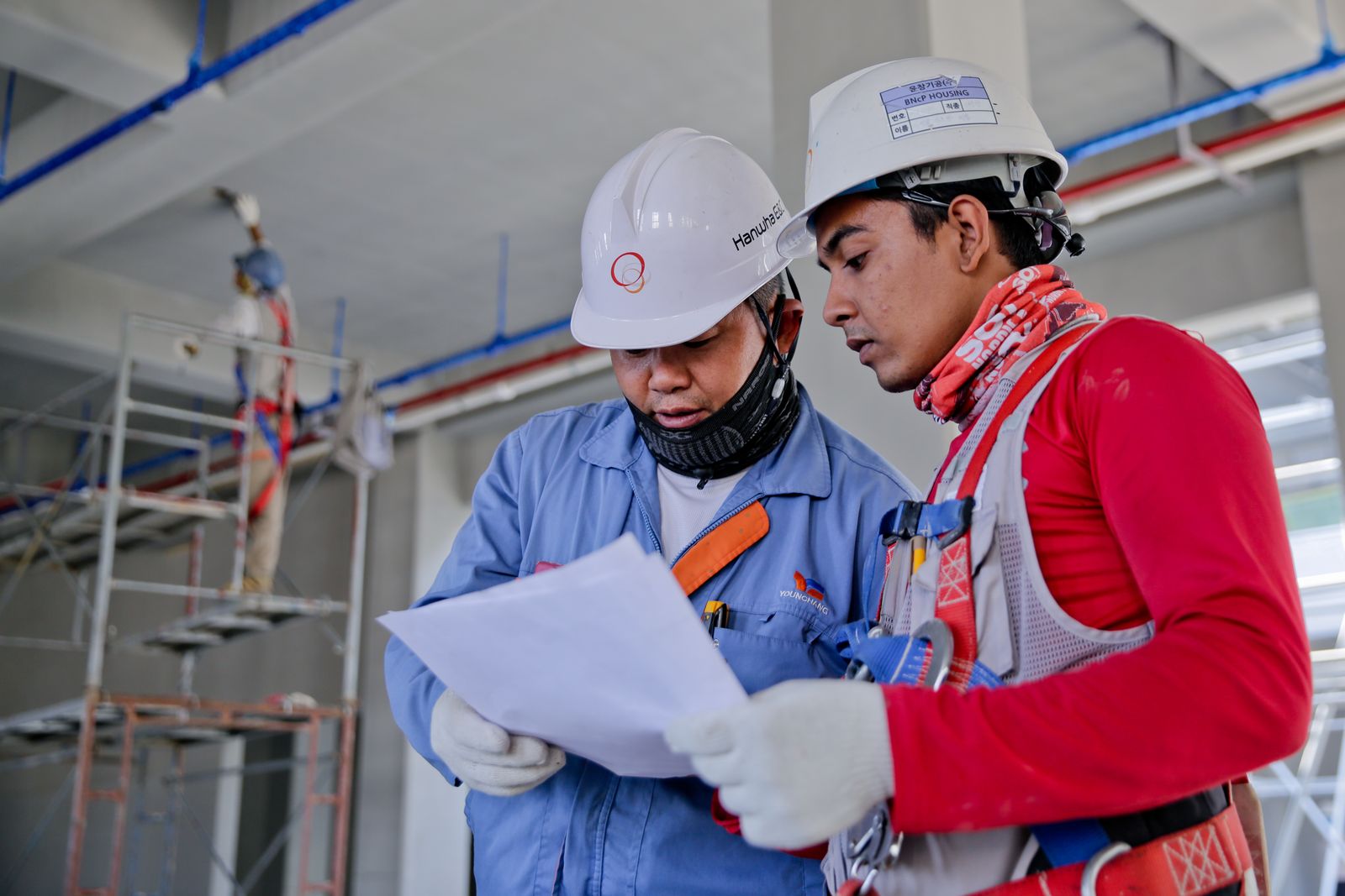Representative engineering team reviewing plans